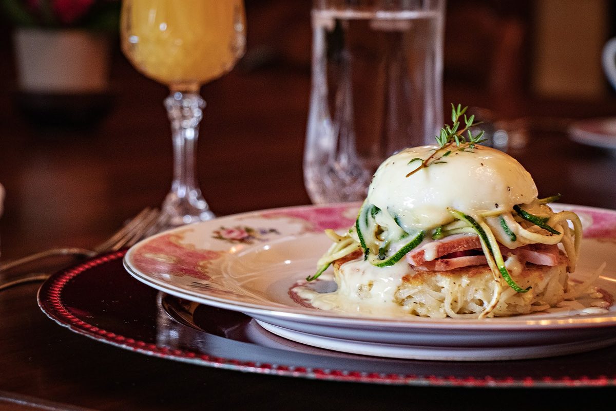 Third course — eggs Benedict on potato cake with zucchini ribbons and hollandaise