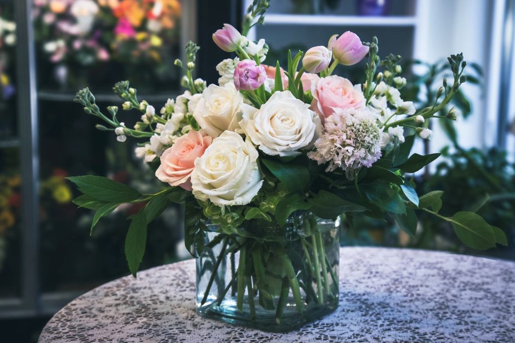 A fresh arrangement of roses and tulips ready to welcome guests to their room at The Reynolds Mansion