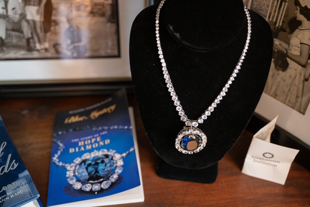 Hope Diamond replica on display at The Reynolds Mansion with Smithsonian Institution provenance card visible