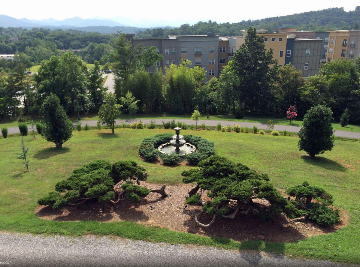 Reynolds Village in Asheville — shops, restaurants, and a walkable neighborhood just five minutes from The Reynolds Mansion
