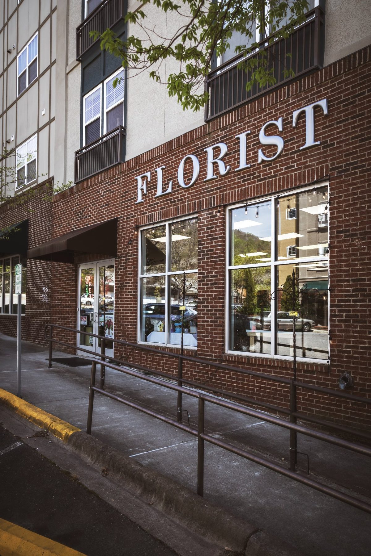 Briar Patch florist storefront — brick building with large windows and a FLORIST sign