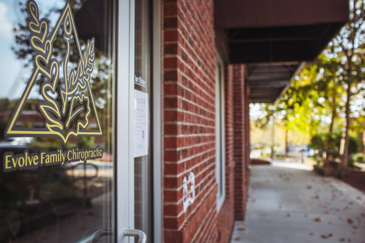 Evolve Family Chiropractic door signage in Reynolds Village