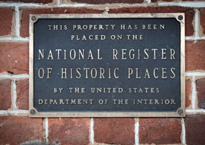 Plaque indicating a property is listed on the National Register of Historic Places.